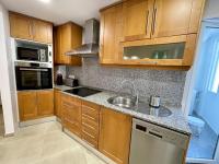 A kitchen or kitchenette at Piso en el Puerto de Dénia con balcón