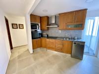 A kitchen or kitchenette at Piso en el Puerto de Dénia con balcón