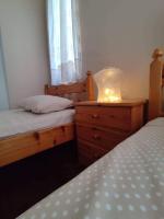 Posteľ alebo postele v izbe v ubytovaní Katerina 's Penthouse