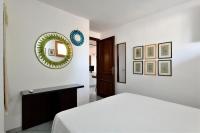 Posteľ alebo postele v izbe v ubytovaní Villa Belvedere-appartamento Family