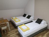 Posteľ alebo postele v izbe v ubytovaní Apartamenty, Zielone Wzgórze Wiktora w Mikołajkach