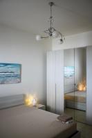 Posteľ alebo postele v izbe v ubytovaní Giu Al Mar - Apartment