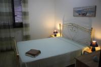 Posteľ alebo postele v izbe v ubytovaní Giu Al Mar - Apartment