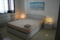 Posteľ alebo postele v izbe v ubytovaní Giu Al Mar - Apartment