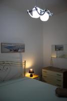 Posteľ alebo postele v izbe v ubytovaní Giu Al Mar - Apartment