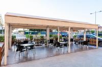 Reštaurácia alebo iné gastronomické zariadenie v ubytovaní Hotel Olympia Ronda I