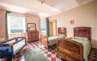 Postel nebo postele na pokoji v ubytování Villa Osvalda