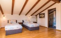 Postel nebo postele na pokoji v ubytování Holiday Home Manjadvorci Manjadvorci