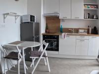 Kuchyňa alebo kuchynka v ubytovaní Studio Cosy Chambray-Les-Tours