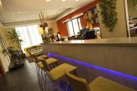 Reštaurácia alebo iné gastronomické zariadenie v ubytovaní Hotel Regio