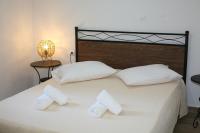 Posteľ alebo postele v izbe v ubytovaní Aeraki House