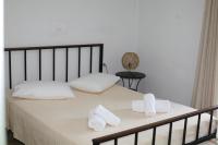 Posteľ alebo postele v izbe v ubytovaní Aeraki House