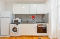 Villa Apartments & Suitesにあるキッチンまたは簡易キッチン
