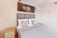 Villa Apartments & Suitesにあるベッド