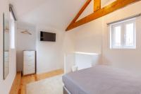 Villa Apartments & Suitesにあるベッド