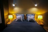 Łóżko lub łóżka w pokoju w obiekcie Le Bois, T2 hypercentre chic et cosy, Wifi par SOVALFI