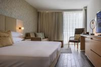 Ein Bett oder Betten in einem Zimmer der Unterkunft Lagoona by Isrotel Collection