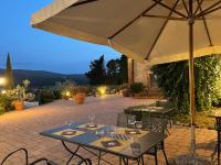 Patio alebo iná vonkajšia časť ubytovania IL COLOMBAIO WINERY & Rooms