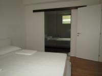 A bed or beds in a room at Agriturismo Colle della Pace
