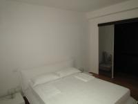A bed or beds in a room at Agriturismo Colle della Pace