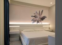 Posteľ alebo postele v izbe v ubytovaní DEMSI Palace Hotel & Restaurant