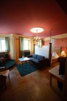 A bed or beds in a room at Gasthof Hotel Zweimüller