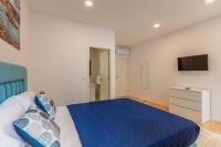 Villa Apartments & Suitesにあるベッド
