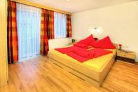 Postel nebo postele na pokoji v ubytování Appartements Avenzio