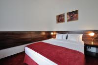 Posteľ alebo postele v izbe v ubytovaní Hotel Centrum Sosnowiec