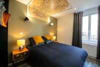 Posteľ alebo postele v izbe v ubytovaní L'Egyptien, T2 hypercentre chic et cosy, Wifi par SOVALFI