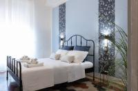 Posteľ alebo postele v izbe v ubytovaní Donna Elena - Epoque Residence