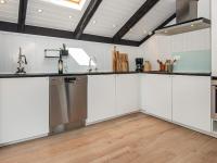Kuchyň nebo kuchyňský kout v ubytování Holiday home Hejls LV