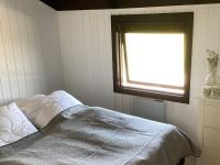 Postel nebo postele na pokoji v ubytování Holiday home Hejls LV