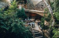 an overhead view of a restaurant with people sitting at tables at Kan Tulum Hotel in Tulum
