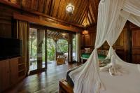 Bubu Mesari Ubud Villaにあるベッド