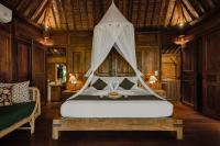 Bubu Mesari Ubud Villaにあるベッド