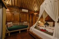 Bubu Mesari Ubud Villaにあるベッド
