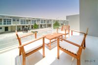 Balkón nebo terasa v ubytování Cheerful 3BR Townhouse at DAMAC Hills 2, Dubailand by Deluxe Holiday Homes