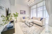 Posezení v ubytování Cheerful 3BR Townhouse at DAMAC Hills 2, Dubailand by Deluxe Holiday Homes