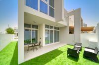 Patio nebo venkovní prostory v ubytování Cheerful 3BR Townhouse at DAMAC Hills 2, Dubailand by Deluxe Holiday Homes