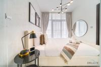 Postel nebo postele na pokoji v ubytování Cheerful 3BR Townhouse at DAMAC Hills 2, Dubailand by Deluxe Holiday Homes