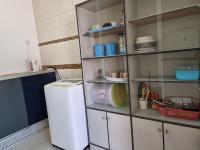 Sweethome Homestay Sandakanにあるキッチンまたは簡易キッチン