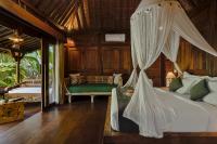 Bubu Mesari Ubud Villaにあるベッド