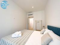 Posteľ alebo postele v izbe v ubytovaní Slataper 9 Tirabora Short Rent