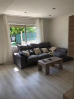 Posezení v ubytování Vivienda amplia y luminosa a escasos metros de la playa de Cangas.