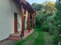 Vonkajšia záhrada v ubytovaní House w little tropical garden