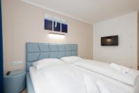 Postel nebo postele na pokoji v ubytování Yourapartment Theresien