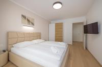 Postel nebo postele na pokoji v ubytování Yourapartment Theresien