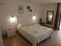 A bed or beds in a room at Via Roma 28