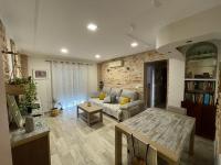 Posezení v ubytování Precioso y renovado apartamento cerca de la playa